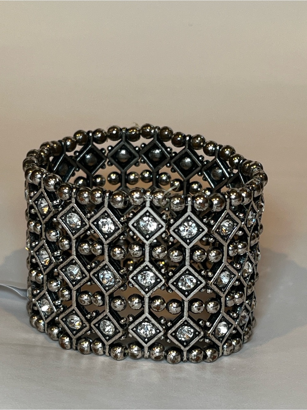Wide silver-tone stretch rhinestone features geometric lattice chunky bracelet